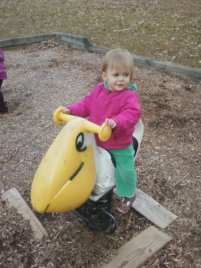 Mckayla also enjoyed the slides, swings, a rocking pelican, and tromping around in the leaves.
