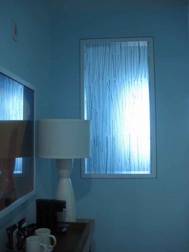 A lovely modern entryway. The little "window" helped to keep it light and bright.