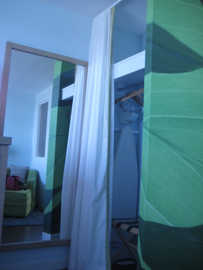 A floor to ceiling white panel made a lovely addition to your normal hotel closet.