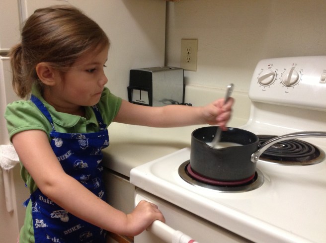 Almost too much for this safety nut to handle. Hopey stirred a pot on the stove for the first time for her bread-making history project.